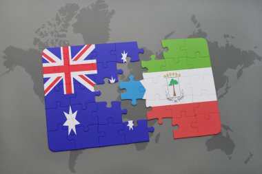 bir dünya haritası arka plan üzerinde Avustralya ve ekvator ginesi ulusal bayrağı ile bulmaca.