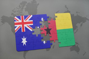 bir dünya haritası arka plan üzerinde Avustralya ve gine bissau ulusal bayrağı ile bulmaca.