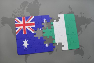 bir dünya haritası arka plan üzerinde Avustralya ve Nijerya ulusal bayrağı ile bulmaca.