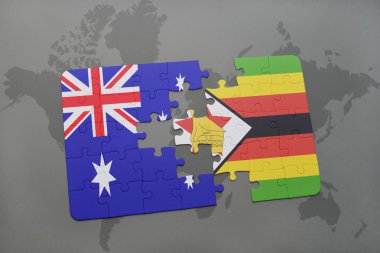 bir dünya haritası arka plan üzerinde Avustralya ve zimbabve ulusal bayrağı ile bulmaca.