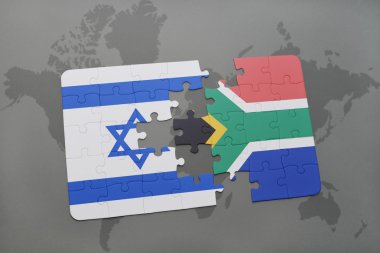 bir dünya haritası arka plan üzerinde İsrail ve Güney Afrika ulusal bayrağı ile bulmaca.