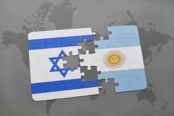 Головоломка з національним прапором Ізраїлю та Аргентини на карті світу. — стокове фото