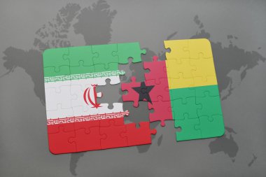 bir dünya haritası arka plan üzerinde İran ve gine bissau ulusal bayrağı ile bulmaca.