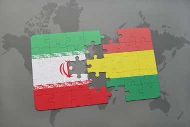 bir dünya haritası arka plan üzerinde İran ve Bolivya ulusal bayrağı ile bulmaca.