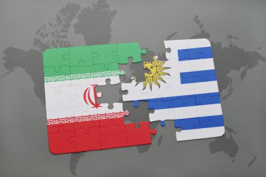 bir dünya haritası arka plan üzerinde İran ve Uruguay ulusal bayrağı ile bulmaca.