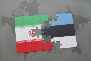 bir dünya haritası arka plan üzerinde İran ve Estonya ulusal bayrağı ile bulmaca.