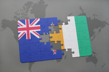 bir dünya haritası arka plan üzerinde yeni zelanda ve cote divoire ulusal bayrağı ile bulmaca.