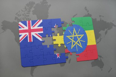 bir dünya haritası arka plan üzerinde Yeni Zelanda ve Etiyopya ulusal bayrağı ile bulmaca.
