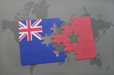 bir dünya haritası arka plan üzerinde Yeni Zelanda ve Fas ulusal bayrağı ile bulmaca.