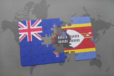 Yeni Zelanda ve Svaziland dünya harita arka plan üzerinde bayrağı ile bulmaca.