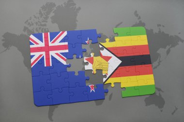 Dünya harita arka plan üzerinde Yeni Zelanda ve Zimbabve Ulusal bayrakla bulmaca.