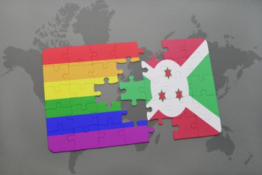bir dünya haritası arka plan üzerinde burundi ve gay gökkuşağı bayrağı ulusal bayrağı ile bulmaca.