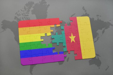 bir dünya haritası arka plan üzerinde kamerun ve eşcinsel gökkuşağı bayrağı ulusal bayrağı ile bulmaca.
