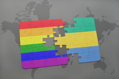 bir dünya haritası arka plan üzerinde gabon ve gay gökkuşağı bayrağı ulusal bayrağı ile bulmaca.