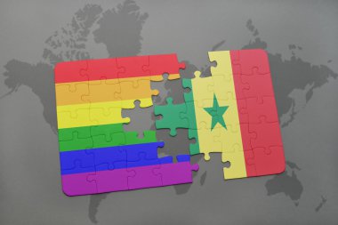 bir dünya haritası arka plan üzerinde senegal ve eşcinsel gökkuşağı bayrağı ulusal bayrağı ile bulmaca.
