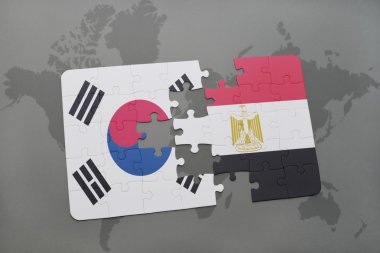 bir dünya haritası arka plan üzerinde Güney Kore ve Mısır ulusal bayrağı ile bulmaca.