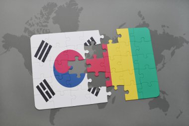 bir dünya haritası arka plan üzerinde Güney Kore ve Gine ulusal bayrağı ile bulmaca.