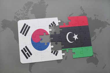 bir dünya haritası arka plan üzerinde Güney Kore ve Libya ulusal bayrağı ile bulmaca.