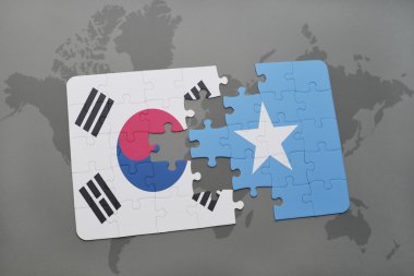 bir dünya haritası arka plan üzerinde Güney Kore ve Somali ulusal bayrağı ile bulmaca.