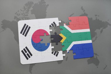bir dünya haritası arka plan üzerinde Güney Kore ve Güney Afrika ulusal bayrağı ile bulmaca.