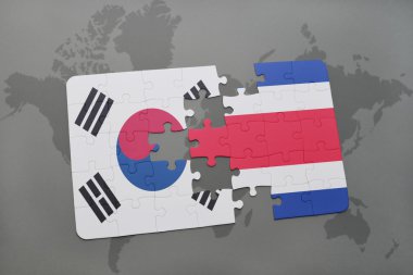 bir dünya haritası arka plan üzerinde Güney Kore ve Kosta Rika ulusal bayrağı ile bulmaca.