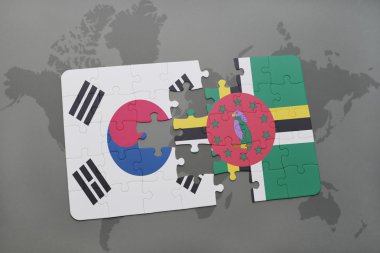 bir dünya haritası arka plan üzerinde Güney Kore ve Dominika ulusal bayrağı ile bulmaca.