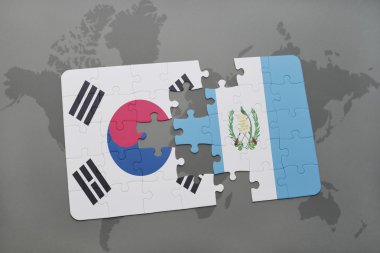 bir dünya haritası arka plan üzerinde güney kore ve guatemala ulusal bayrağı ile bulmaca.