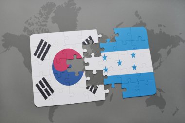 bir dünya haritası arka plan üzerinde güney kore ve honduras ulusal bayrağı ile bulmaca.