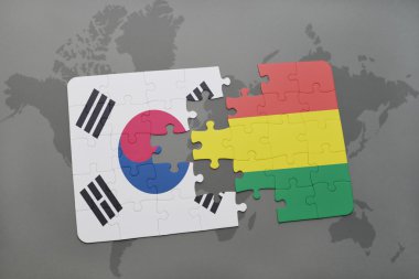 bir dünya haritası arka plan üzerinde Güney Kore ve Bolivya ulusal bayrağı ile bulmaca.