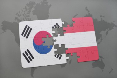 bir dünya haritası arka plan üzerinde Güney Kore ve Avusturya ulusal bayrağı ile bulmaca.