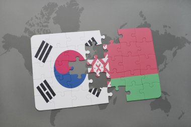 bir dünya haritası arka plan üzerinde Güney Kore ve Beyaz Rusya ulusal bayrağı ile bulmaca.