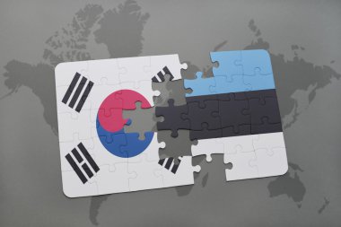 bir dünya haritası arka plan üzerinde Güney Kore ve Estonya ulusal bayrağı ile bulmaca.