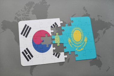 bir dünya haritası arka plan üzerinde Güney Kore ve Kazakistan ulusal bayrağı ile bulmaca.