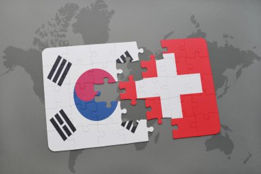 Güney Kore ve İsviçre ulusal bayrak dünya harita arka plan üzerinde ile bulmaca.