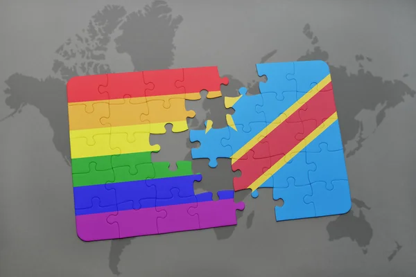 Puzzle z flagą narodowej Demokratycznej Republiki Konga i gejowskiej flagi tęczy na mapie świata tle. — Zdjęcie stockowe