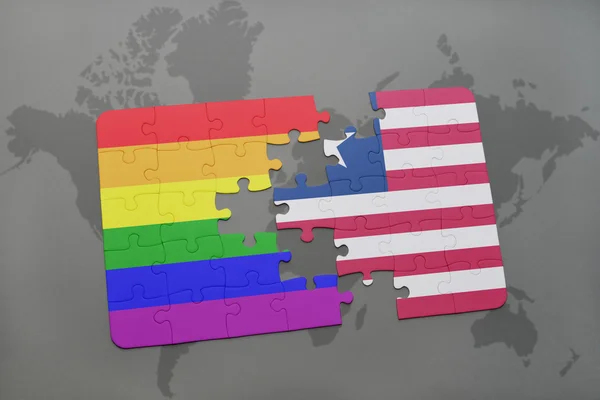Puzzle a nemzeti zászló Libéria és a homoszexuális Szivárvány zászló a világtérképen háttér. — Stock Fotó
