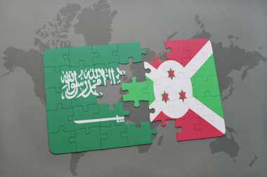 bir dünya haritası arka plan üzerinde Suudi Arabistan ve Burundi ulusal bayrağı ile bulmaca.