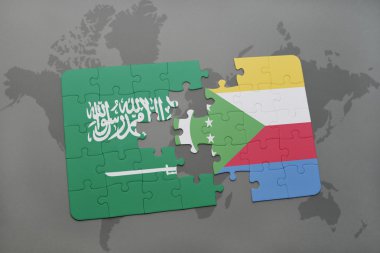 bir dünya haritası arka plan üzerinde Suudi Arabistan ve komorulusal bayrağı ile bulmaca.