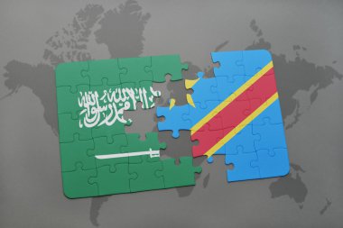 bir dünya haritası arka plan üzerinde Suudi Arabistan ve Kongo Demokratik Cumhuriyeti ulusal bayrağı ile bulmaca.