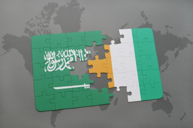 bir dünya haritası arka plan üzerinde Suudi Arabistan ve cote divoire ulusal bayrağı ile bulmaca.