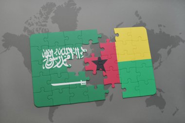 bir dünya haritası arka plan üzerinde Suudi Arabistan ve Gine bissau ulusal bayrağı ile bulmaca.