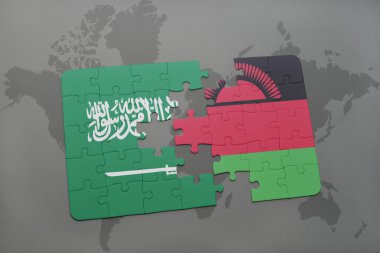 bir dünya haritası arka plan üzerinde Suudi Arabistan ve Malavi ulusal bayrağı ile bulmaca.