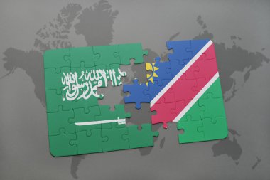 bir dünya haritası arka plan üzerinde Suudi Arabistan ve namibya ulusal bayrağı ile bulmaca.