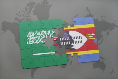 bir dünya haritası arka plan üzerinde Suudi Arabistan ve svaziland ulusal bayrağı ile bulmaca.