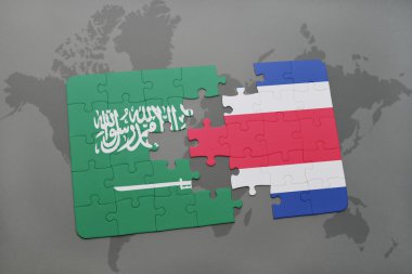 bir dünya haritası arka plan üzerinde Suudi Arabistan ve Kosta Rika ulusal bayrağı ile bulmaca.