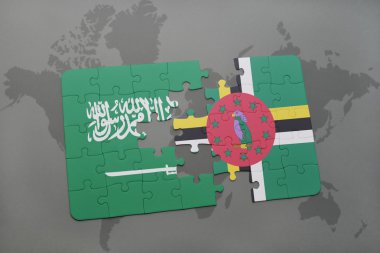 bir dünya haritası arka plan üzerinde Suudi Arabistan ve Dominika ulusal bayrağı ile bulmaca.