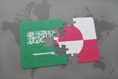 bir dünya haritası arka plan üzerinde Suudi Arabistan ve Grönland ulusal bayrağı ile bulmaca.