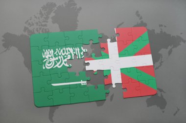 bir dünya haritası arka plan üzerinde Suudi Arabistan ve Bask ülkesinin ulusal bayrağı ile bulmaca.