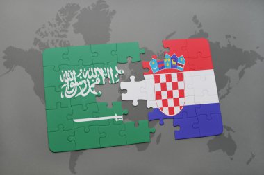 bir dünya haritası arka plan üzerinde Suudi Arabistan ve Hırvatistan ulusal bayrağı ile bulmaca.