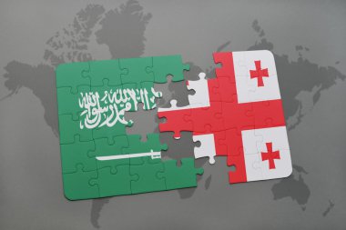 bir dünya haritası arka plan üzerinde Suudi Arabistan ve Gürcistan ulusal bayrağı ile bulmaca.